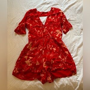 Red pattern romper medium